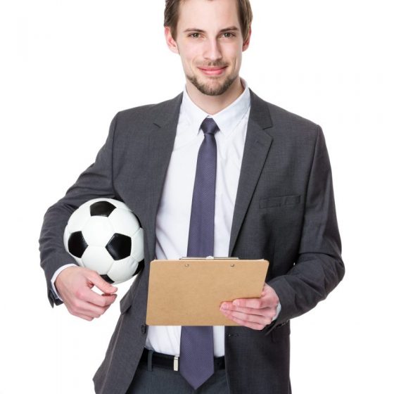 Football manager hold with soccer ball and clipboard Football manager hold with soccer ball and clipboard